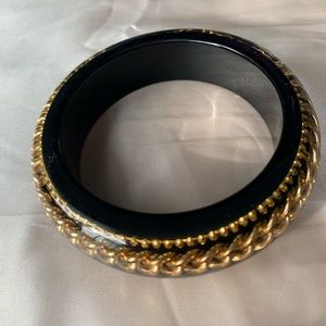 Black bangle with chain detailing